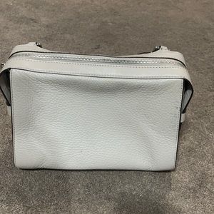 Beige. MK. Small purse. Hand bag/ crossbody. Used.